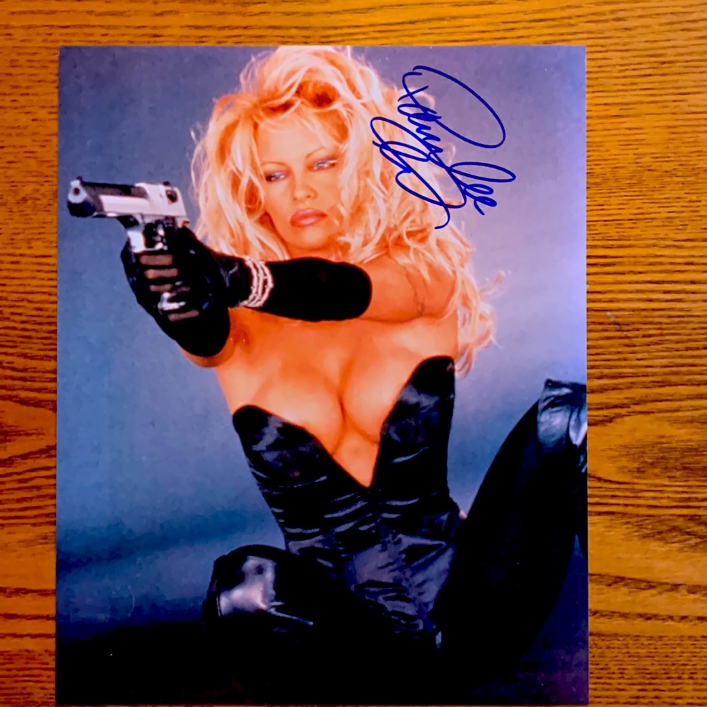 Authentic Pamela Anderson autographed photo. 8 x 10 inches